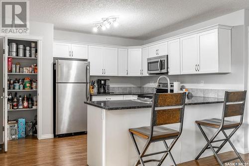 323 125 Willis Crescent, Saskatoon, SK - Indoor Photo Showing Kitchen With Stainless Steel Kitchen