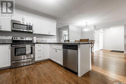 323 125 Willis Crescent, Saskatoon, SK - Indoor Photo Showing Kitchen With Stainless Steel Kitchen With Upgraded Kitchen