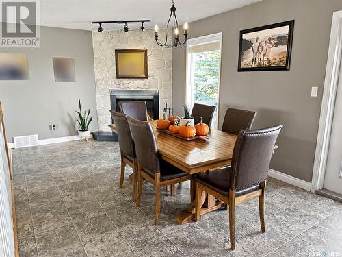 Nw City Limit Acreage, Swift Current Rm No. 137, SK - Indoor Photo Showing Dining Room With Fireplace