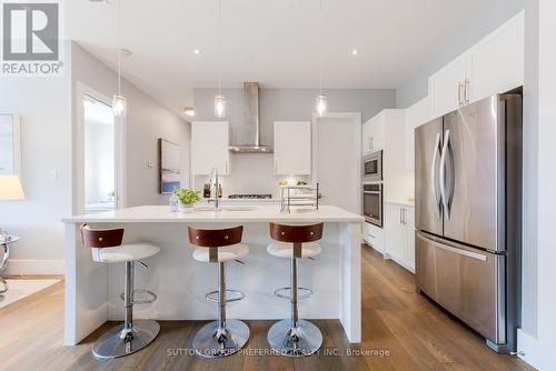 102 - 1705 Fiddlehead Place, London, ON - Indoor Photo Showing Kitchen With Double Sink With Upgraded Kitchen