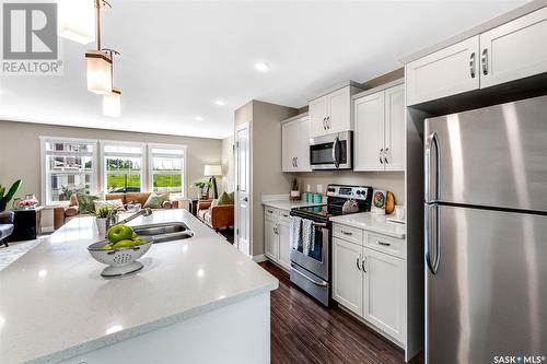 212 1220 Pringle Way, Saskatoon, SK - Indoor Photo Showing Kitchen With Double Sink With Upgraded Kitchen