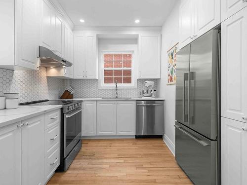 Cuisine - 165 Rue Lapalme, Montréal (Saint-Laurent), QC - Indoor Photo Showing Kitchen With Upgraded Kitchen