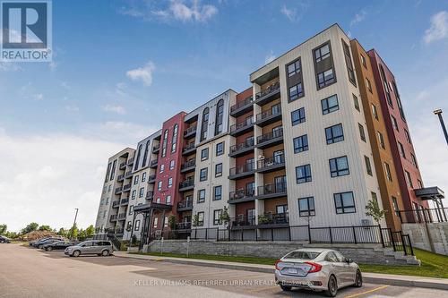 104 - 10 Culinary Lane, Barrie, ON - Outdoor With Facade