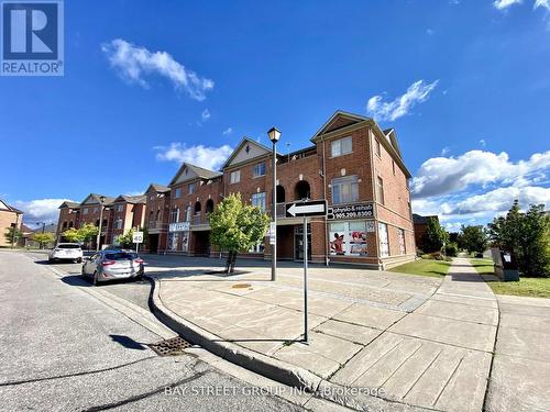 64 - 2275 Bur Oak Avenue, Markham, ON - Outdoor With Facade