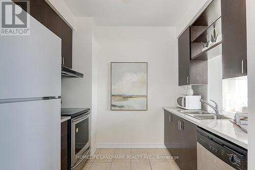 Uph 05 - 60 Town Centre Court, Toronto, ON - Indoor Photo Showing Kitchen With Double Sink