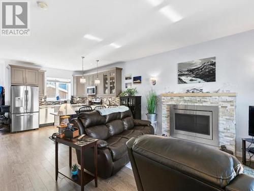 13-85 Aksala Drive, Whitehorse, YT - Indoor Photo Showing Living Room With Fireplace