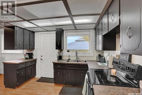 203 Church Drive, Regina, SK - Indoor Photo Showing Kitchen With Double Sink