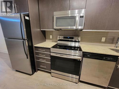 515 - 7608 Yonge Street, Vaughan, ON - Indoor Photo Showing Kitchen With Stainless Steel Kitchen