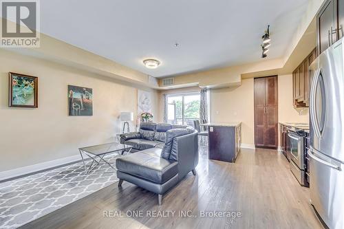 222 - 128 Garden Drive, Oakville, ON - Indoor Photo Showing Living Room