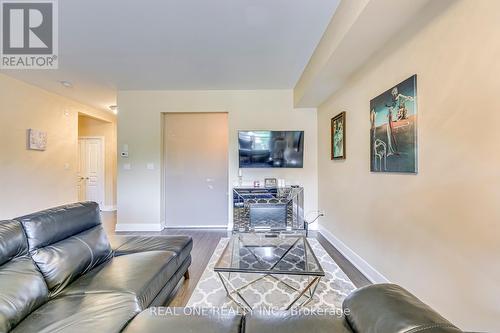 222 - 128 Garden Drive, Oakville, ON - Indoor Photo Showing Living Room