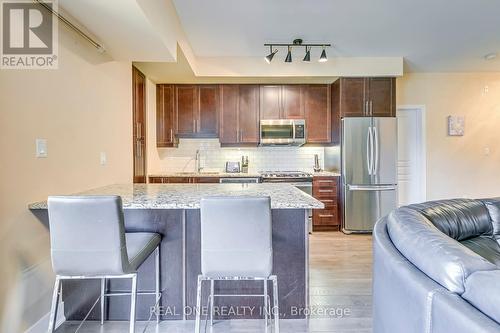 222 - 128 Garden Drive, Oakville, ON - Indoor Photo Showing Kitchen With Stainless Steel Kitchen With Upgraded Kitchen