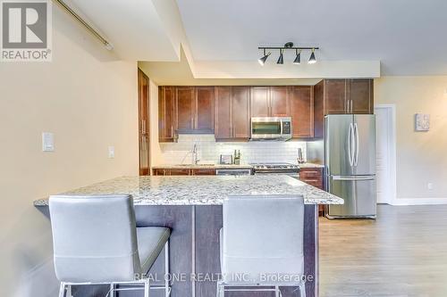 222 - 128 Garden Drive, Oakville, ON - Indoor Photo Showing Kitchen With Stainless Steel Kitchen With Upgraded Kitchen