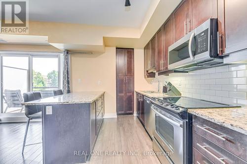 222 - 128 Garden Drive, Oakville, ON - Indoor Photo Showing Kitchen With Upgraded Kitchen