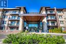 222 - 128 Garden Drive, Oakville, ON  - Outdoor With Balcony With Facade 