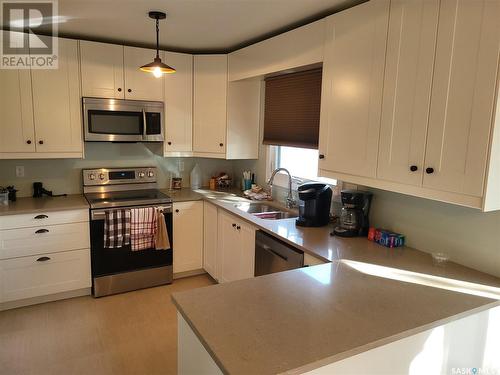 41 Klaehn Crescent, Saskatoon, SK - Indoor Photo Showing Kitchen With Double Sink