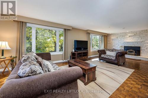 2776 Pigeon Lake Road, Kawartha Lakes, ON - Indoor Photo Showing Living Room With Fireplace