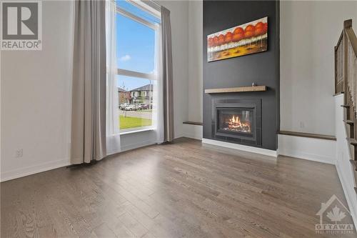 301 Chamomile Way, Ottawa, ON - Indoor Photo Showing Living Room With Fireplace