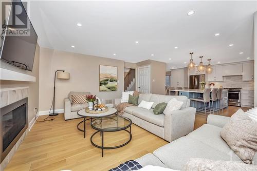 75 Saddlehorn Crescent, Kanata, ON - Indoor Photo Showing Living Room With Fireplace