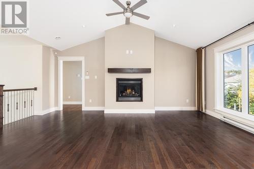 6 River Front Drive, St. Philips, NL - Indoor Photo Showing Other Room With Fireplace