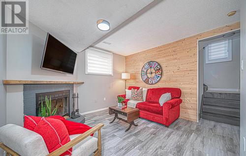 96 Freeland Avenue, Clarington (Bowmanville), ON - Indoor Photo Showing Living Room With Fireplace