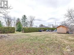 Rear view with access to 5961 Perth St. lot - 