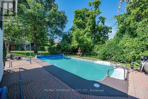 311 Supple Street, Pembroke, ON - Outdoor With In Ground Pool With Backyard