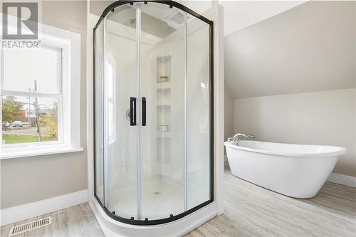 New freestanding shower has just been installed - 24 Munroe Avenue E, Renfrew, ON - Indoor Photo Showing Bathroom