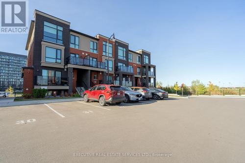 14 - 195 Veterans Drive, Brampton, ON - Outdoor With Facade