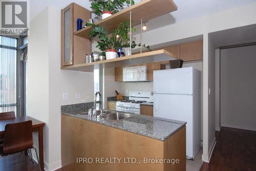 310 - 5 Mariner Terrace, Toronto, ON - Indoor Photo Showing Kitchen With Double Sink