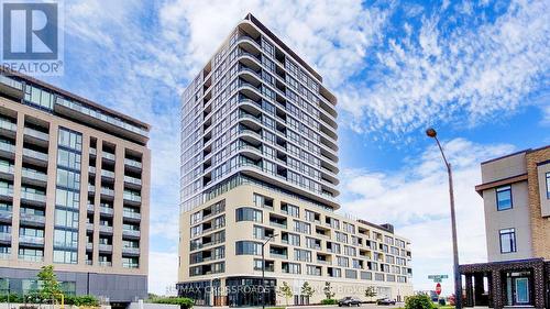 903 - 120 Eagle Rock Way, Vaughan, ON - Outdoor With Balcony With Facade