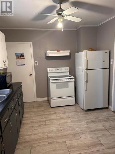 390-396 Main Road, Trepassey, NL - Indoor Photo Showing Kitchen With Double Sink