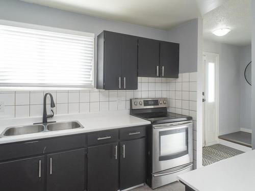 402 Brant St, Thunder Bay, ON - Indoor Photo Showing Kitchen With Double Sink