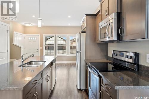 1105 Kolynchuk Link, Saskatoon, SK - Indoor Photo Showing Kitchen With Double Sink