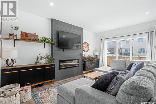 248 Thakur Street, Saskatoon, SK - Indoor Photo Showing Other Room With Fireplace