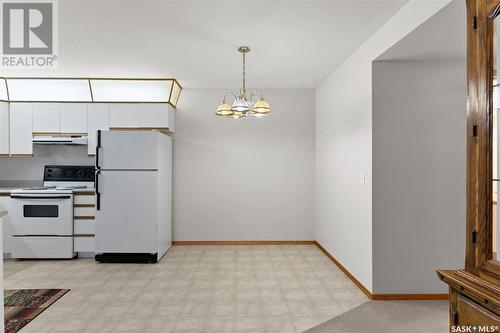 101 214 Ross Avenue, Dalmeny, SK - Indoor Photo Showing Kitchen