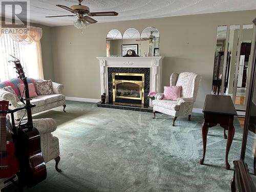 7 Main Road, Freshwater, NL - Indoor Photo Showing Living Room With Fireplace