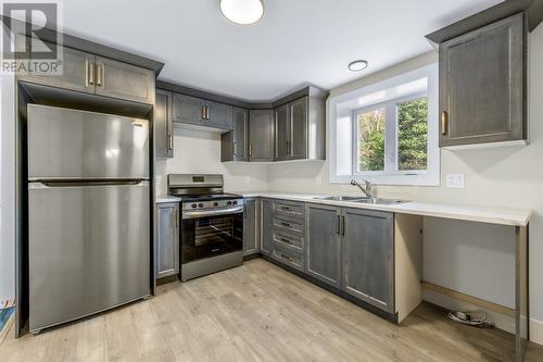 35 Markham Drive, St. Philips, NL - Indoor Photo Showing Kitchen With Double Sink