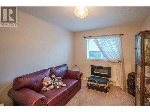 250 Scott Avenue Unit# 102, Penticton, BC - Indoor Photo Showing Other Room With Fireplace