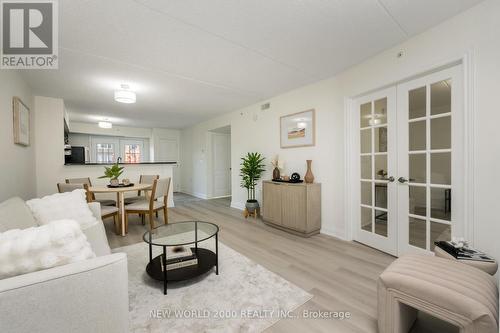 307 - 1440 Main Street E, Milton, ON - Indoor Photo Showing Living Room