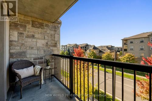 307 - 1440 Main Street E, Milton, ON - Outdoor With Balcony With Exterior