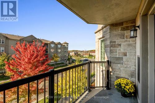 307 - 1440 Main Street E, Milton, ON - Outdoor With Balcony With Exterior