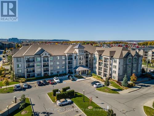 307 - 1440 Main Street E, Milton, ON - Outdoor With Facade