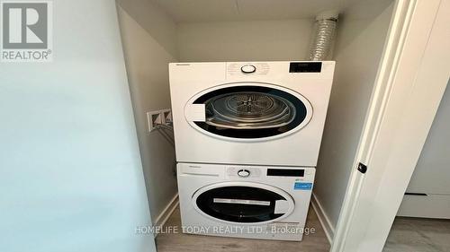 806 - 55 Charles Street E, Toronto, ON - Indoor Photo Showing Laundry Room