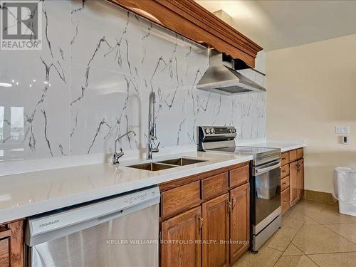 2250 Gilchrist Bay Road, Douro-Dummer, ON - Indoor Photo Showing Kitchen With Double Sink