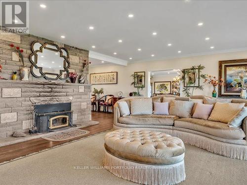 2250 Gilchrist Bay Road, Douro-Dummer, ON - Indoor Photo Showing Living Room With Fireplace