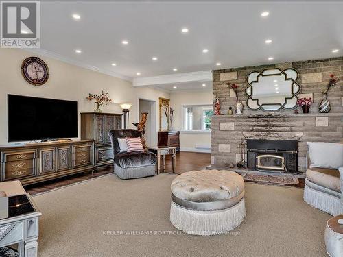 2250 Gilchrist Bay Road, Douro-Dummer, ON - Indoor Photo Showing Living Room With Fireplace