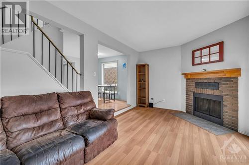 59 Sundback Lane, Ottawa, ON - Indoor Photo Showing Living Room With Fireplace