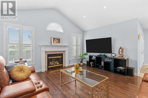 95 Thoroughbred Boulevard, Hamilton, ON - Indoor Photo Showing Living Room With Fireplace