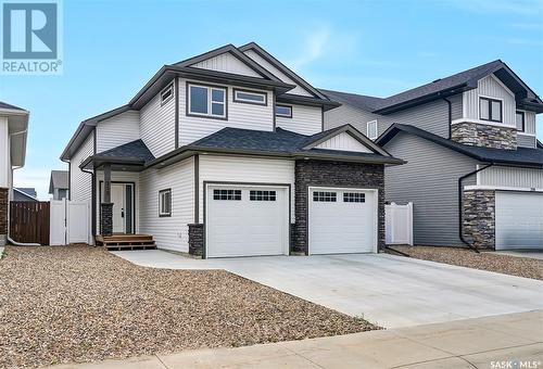 212 Cowan Crescent, Martensville, SK - Outdoor With Facade