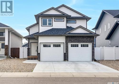 212 Cowan Crescent, Martensville, SK - Outdoor With Facade